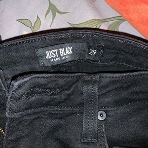 Distressed black jeans mid rise